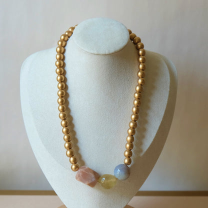 Gemstone necklace on wooden beads
